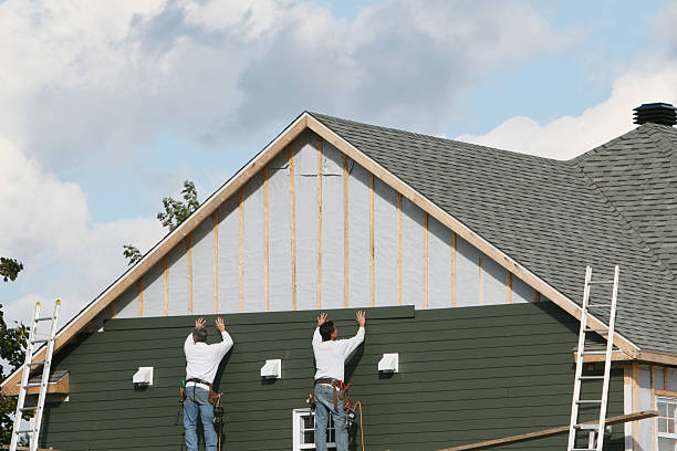 Professional Emergency Siding Repair technician working in Island Lake, IL